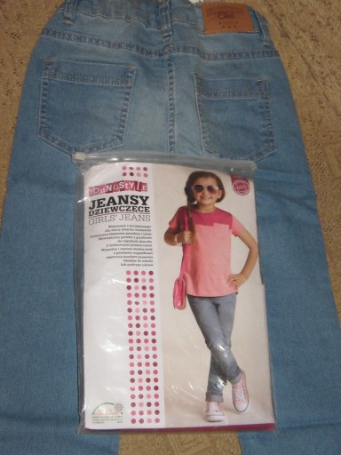 Zdjęcie oferty: Spodnie dżinsowe nowe na 128 cm.