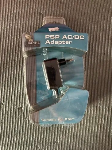 Zdjęcie oferty: Zasilacz ładowarka AC/DC PSP ADAPTER  - PIRANHA (NOWA) 