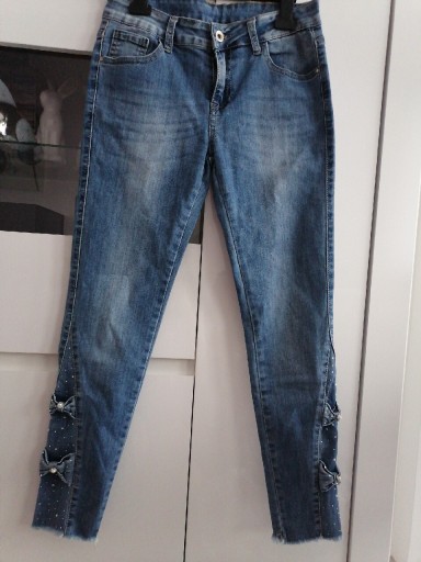 Zdjęcie oferty: Spodnie jeansowe r. M