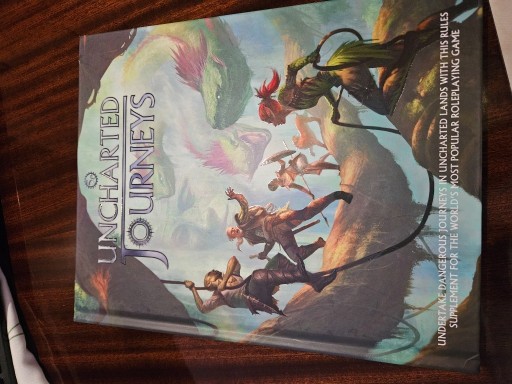 Zdjęcie oferty: Uncharted Journeys Podręcznik RPG (EN)