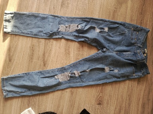 Zdjęcie oferty: Spodnie Jeansowe damskie z przetarciami Vivid