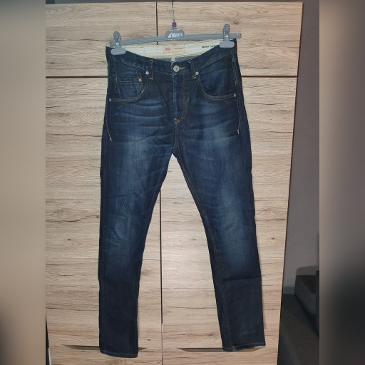 Zdjęcie oferty: Granatowe jeansy River Island