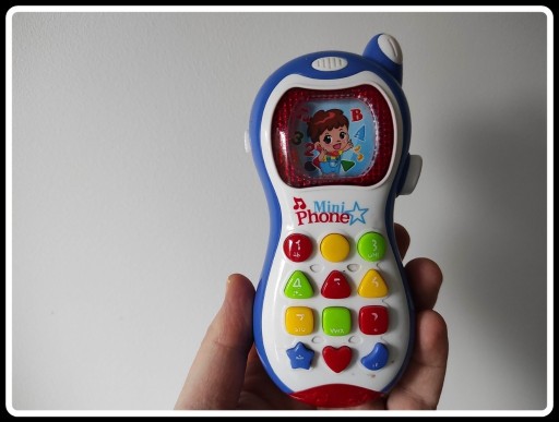 Zdjęcie oferty: telefon interaktywny dla maluszka gra i świeci