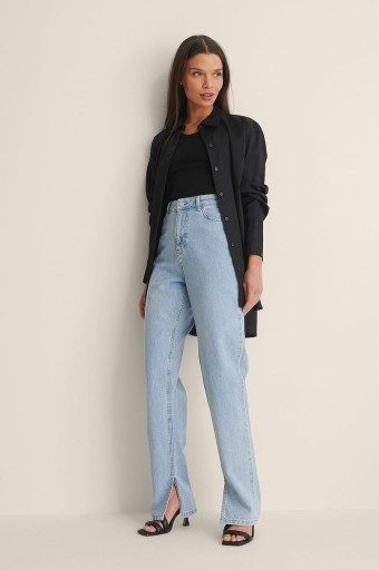 Zdjęcie oferty: Dżinsy jeansy spodnie z bocznym rozcięciem r. 38 M