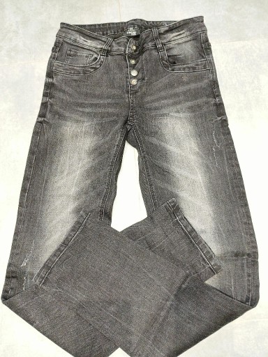 Zdjęcie oferty: Jeansowe spodnie w roz 164