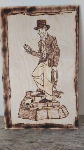 Zdjęcie oferty: Obraz pirografia Indiana Jones 18.6 x 30 cm