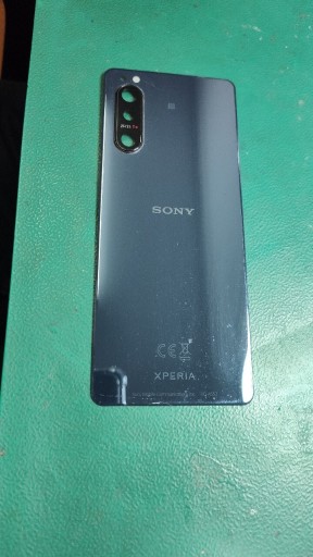 Zdjęcie oferty: Klapka tył pokrywa baterii Sony v ii oczko aparatu