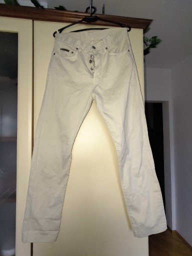 Zdjęcie oferty: Jeansy spodnie beżowe M Calvin Klein