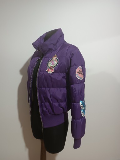 Zdjęcie oferty:  Fioletowa pikowana kurtka używana rozm 9 -10 lat
