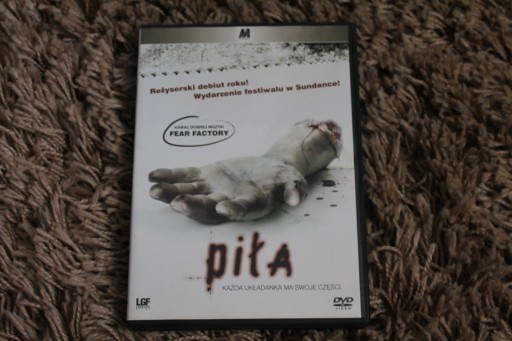 Zdjęcie oferty: (DVD)  PIŁA  wydanie z roku 2004. 