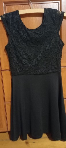 Zdjęcie oferty: Elegancka czarna sukienka dla dziewczynki 158/164
