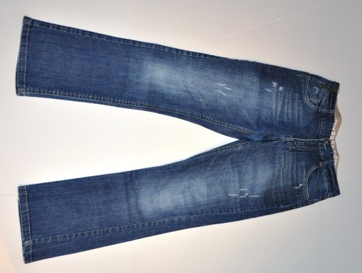 Zdjęcie oferty: Chłopięce spodnie jeansowe marki MILLIONX 152 cm 