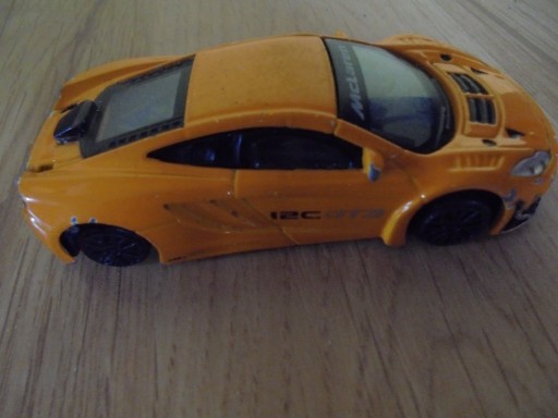 Zdjęcie oferty: autko McLaren12CGT3 1:43 pomarańczowy metal