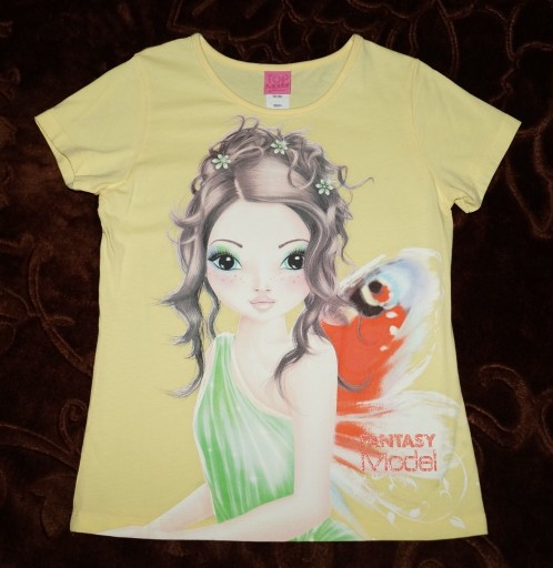 Zdjęcie oferty: Bluzka TOP MODEL 140 Fantasy t-shirt org jak nowa