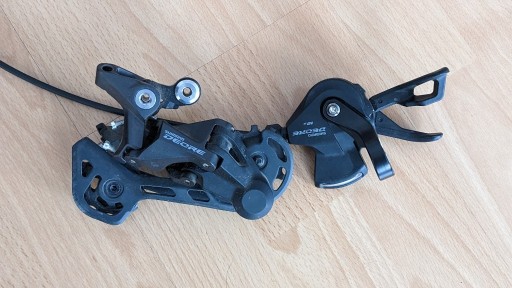 Zdjęcie oferty: Przerzutka Shimano Deore + manetka Derore 10-rz.