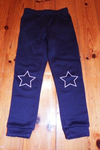 Zdjęcie oferty: granatowe spodnie dresowe dziewczęce 116 gwiazdy