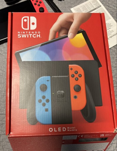 Zdjęcie oferty: Nintendo Switch OLED + SD 128GB + etui, komplet, stan bardzo dobry