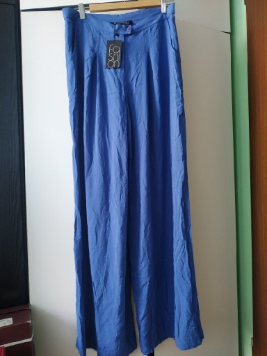 Zdjęcie oferty: Nowe błękitne spodnie Top Secret 40 L  