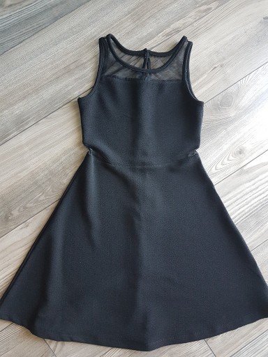 Zdjęcie oferty: Sukienka czarna 146/11-12,fajny fason