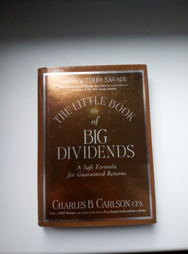 Zdjęcie oferty: The Little Book of Big Dividends - C.B. Carlson