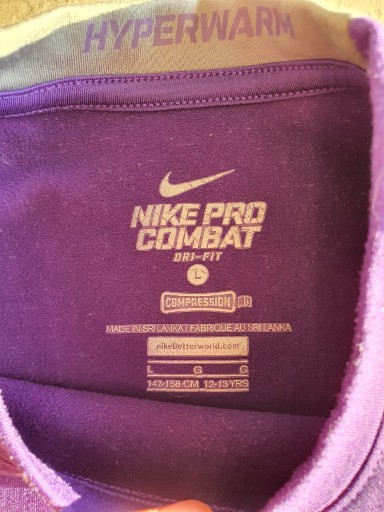 Zdjęcie oferty: Bluzka Nike Pro Combat L 12-13 147-158 śliwka