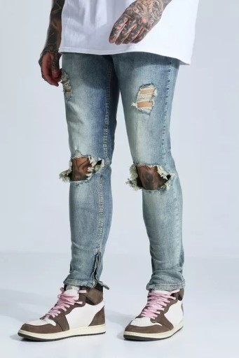 Zdjęcie oferty: spodnie podarte kolana dżinsy jeansy 36R boohooMAN