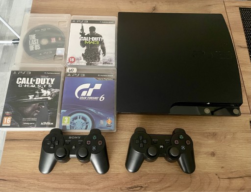 Zdjęcie oferty: PS3 dwa pady 4 gry slim 