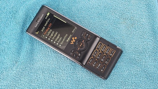 Zdjęcie oferty: Sony Ericsson W595. Czarno-Pomaranczowy