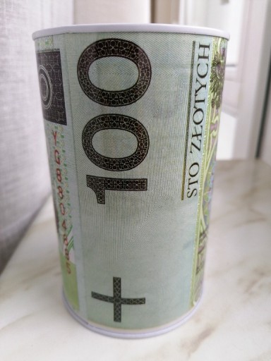 Zdjęcie oferty: Skarbonka puszka z wizerunkiem banknotu 100zł 