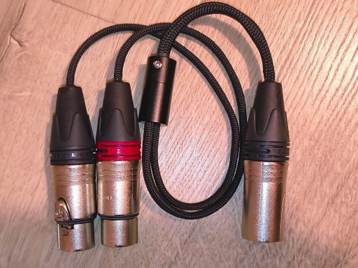 Zdjęcie oferty: Zbalansowana przejściówka do słuchawek XLR4 M na 2xXLR3 F