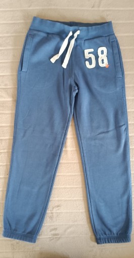 Zdjęcie oferty: Spodnie dresowe niebieskie '58' H&M r.140 