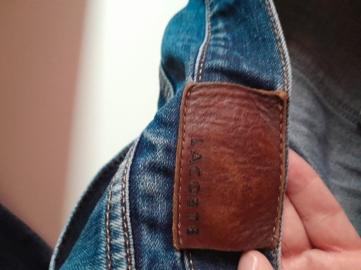 Zdjęcie oferty: Lacoste jeansy na guziki
