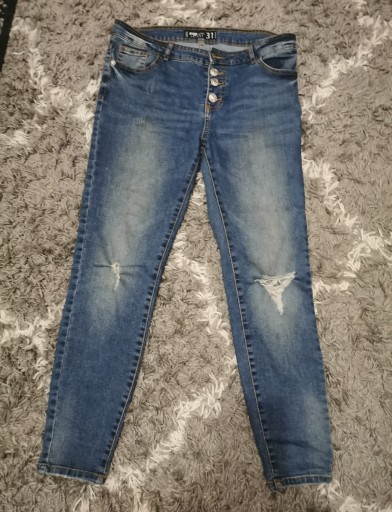 Zdjęcie oferty: spodnie damskie przetarcia jeans L