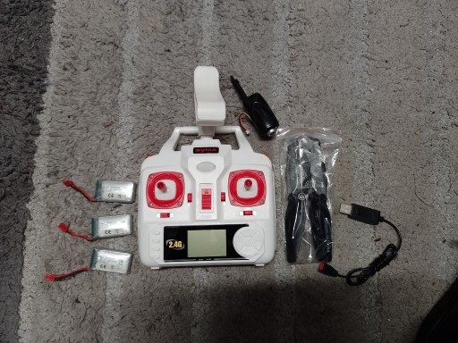 Zdjęcie oferty: Pilot do drona SYMA 2,4G kamerka śmigła kabel USB 