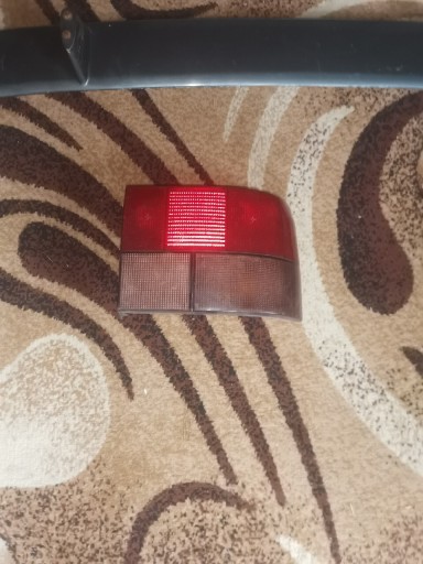 Zdjęcie oferty: Lampa oraz pokrywa swiec Renault 19 16v