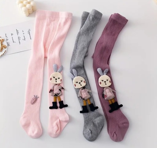 Zdjęcie oferty: Nowe prążkowane rajstopy z maskotką kroliczka