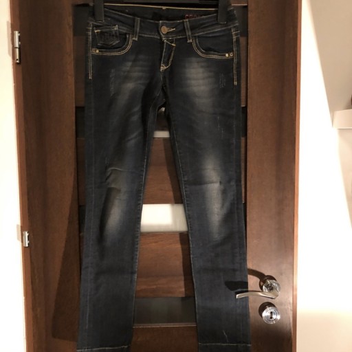 Zdjęcie oferty: Spodnie jeansowe Cross [W26 L30]