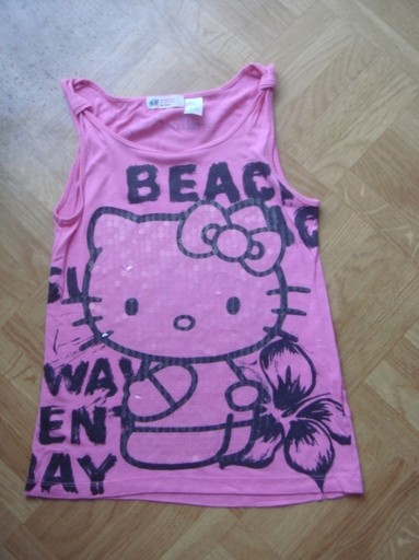 Zdjęcie oferty: H&M różowa bluzka 134 Hello Kitty cekiny