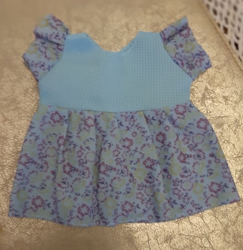 Zdjęcie oferty: Niebieska sukienka z rękawkami dla lalki typu baby