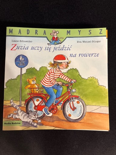 Zdjęcie oferty: Zuzia uczy się jeździć na rowerze książeczka dla dzieci