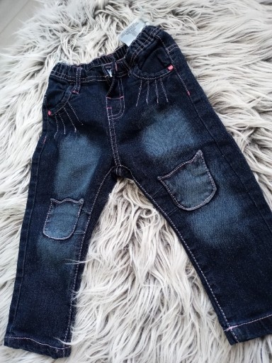 Zdjęcie oferty: Spodnie jeansowe dla dziewczynki r.80