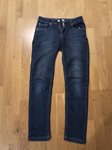 Zdjęcie oferty: Spodnie jeansy Evin rozmiar 28