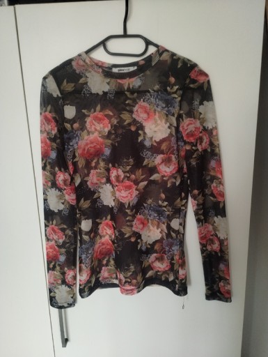 Zdjęcie oferty: Elegancka bluzka ze wzorem kwiatowym.