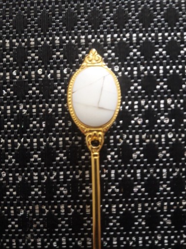 Zdjęcie oferty: stara łyżeczka w kolorze złotym z masą perłową