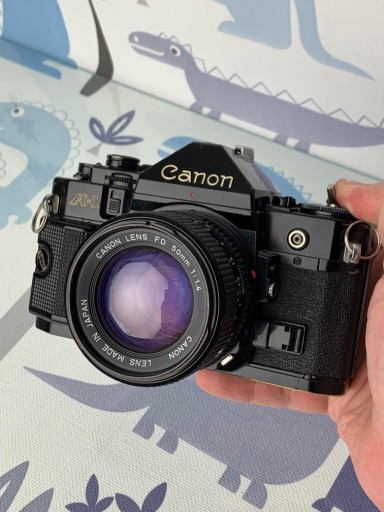 Zdjęcie oferty: Aparat analogowy Canon FD A-1 z obiektywem 1.4/50