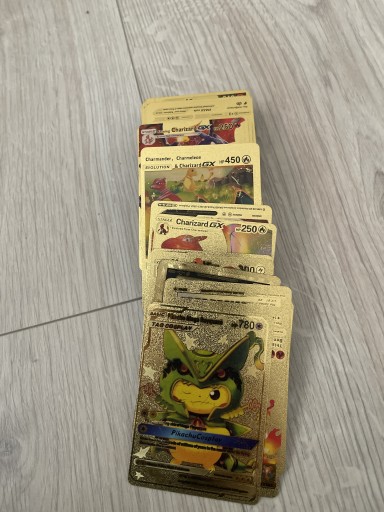 Zdjęcie oferty: 64 złotych kart pokemon 