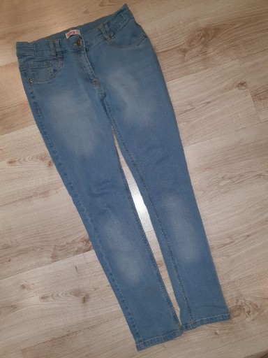 Zdjęcie oferty: 40. Elastyczne jeansy niebieskie miękkie 164
