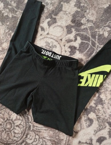Zdjęcie oferty: Ciemnozielone spodnie damskie legginsy Nike getry