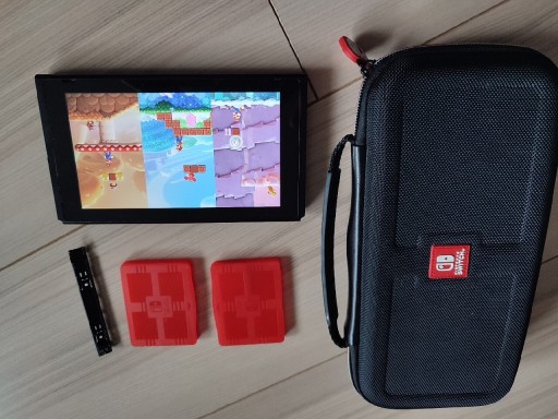 Zdjęcie oferty: Nintendo switch uszkodzony, etui, karta, pokrowiec.