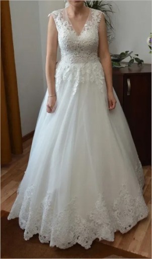 Zdjęcie oferty: Suknia ślubna w kolorze śmietankowym